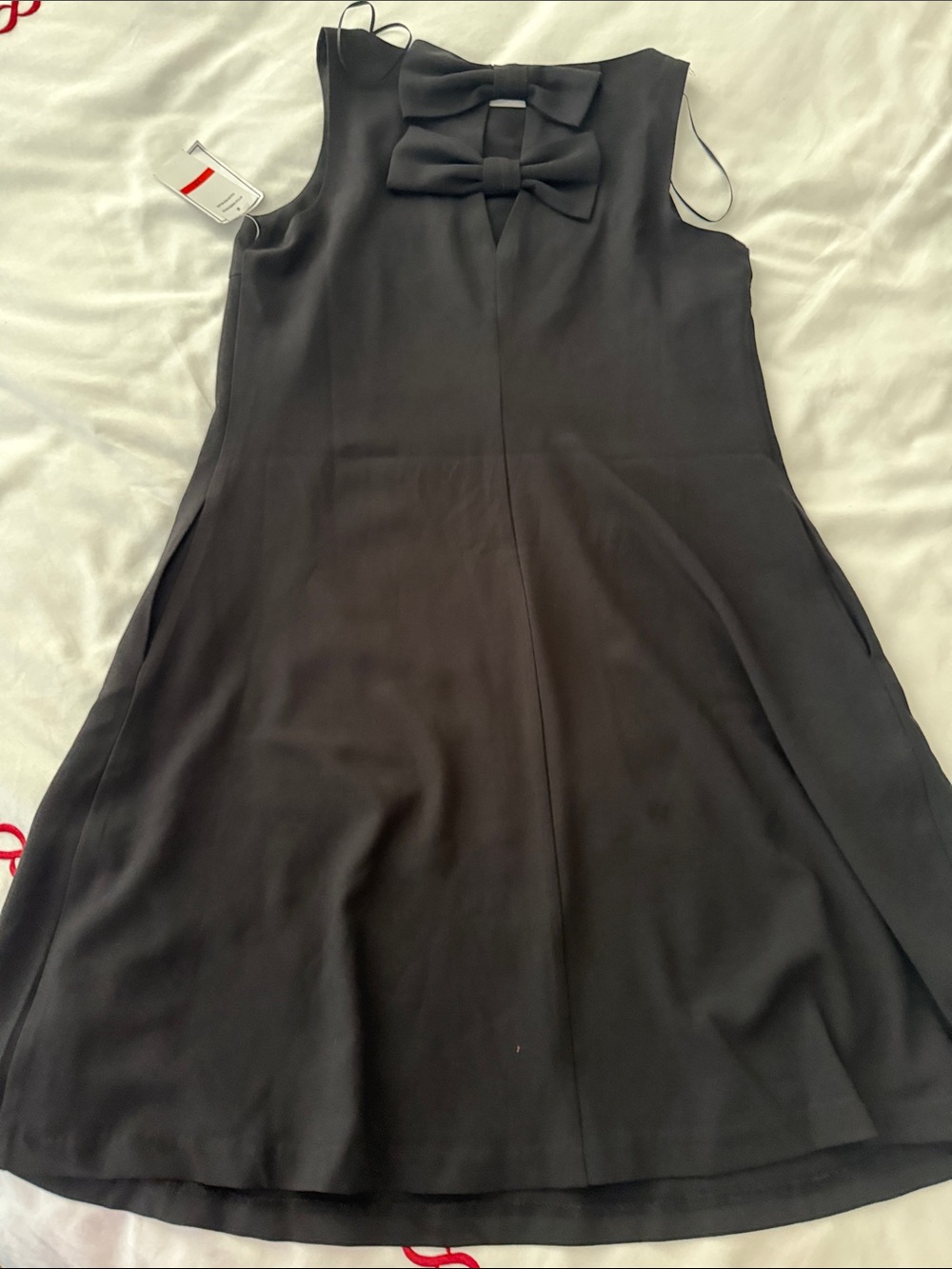 Black Sleeveless Mini Dress with Bow detail